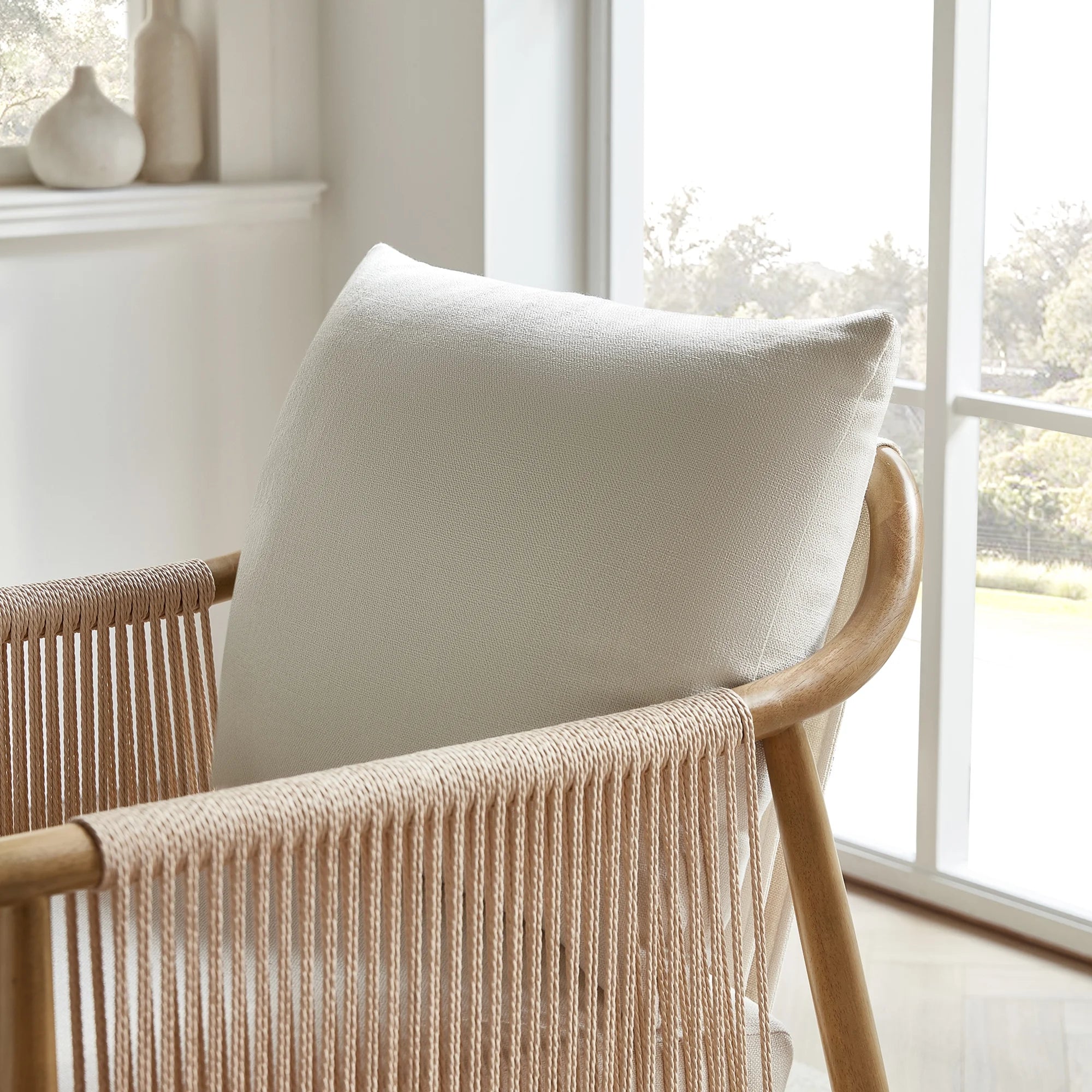 Stylish Cream Braid Armchair for a Chic Living Room Makeover
